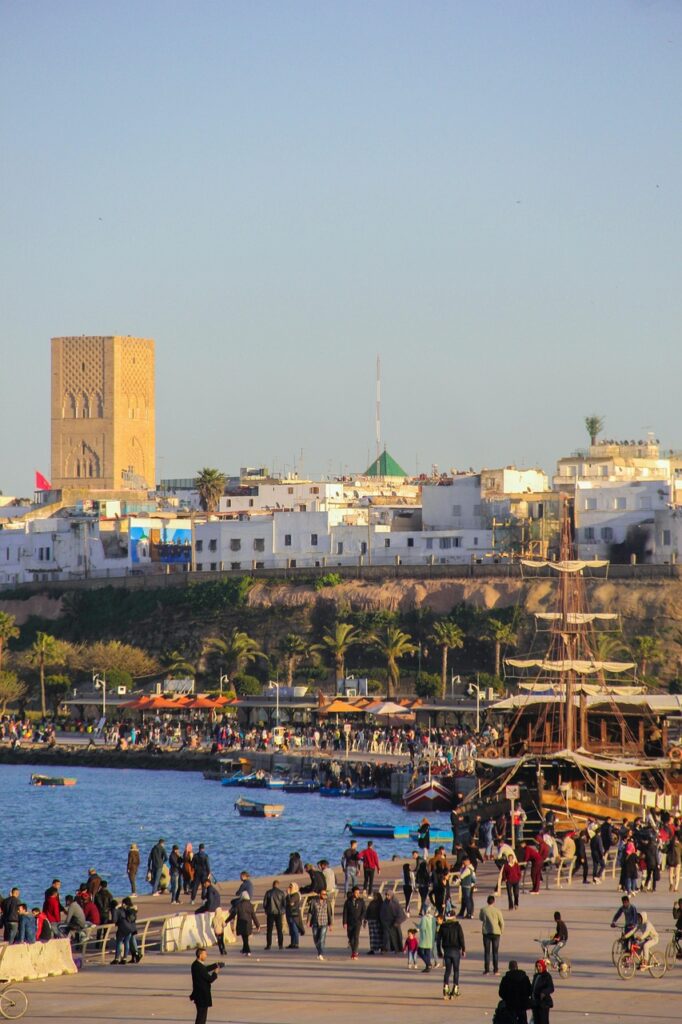rabat, morocco, beach, hassan tower, tower, islam, mosque, people, nature, crowd